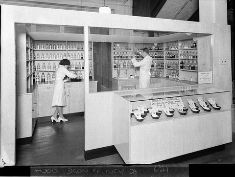 Grace Bros pharmacy department man and woman pharmacists, 1938