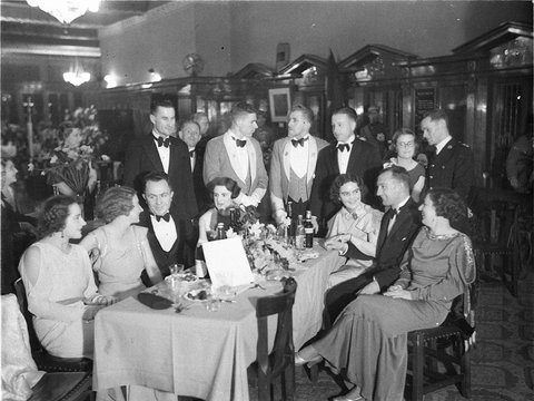 Group of Army officers and civilians at a table, 1934