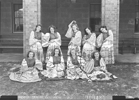Group of nine students in colourful costumes St Catherines Waverley, 1945