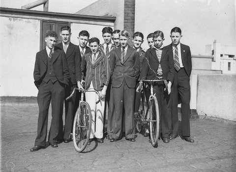 Group of schoolboys with bicycles Dunlop cyclists, 1934