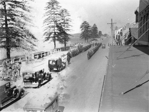 Headed by two long lines of men some are tramwaymen, c. 1934