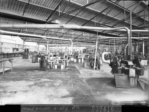 Interior of Slazengers factory showing workers making sporting goods, 1938