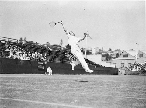 Jack Crawford in the air for a forehand smash, 1930s