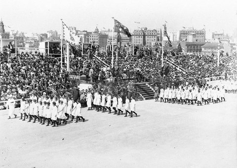 Junior Red Cross girls passing the official dais, 1932