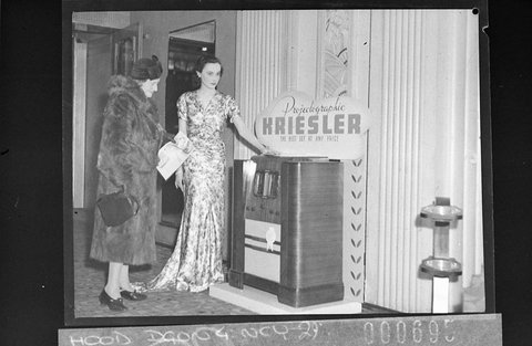 Kriesler radio display at Embassy Theatre for Radio Retailer Usherette demonstrates Projectographic Kriesler radio, 1938