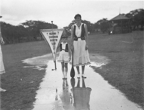Kurri team captain and girl mascot, c. 1934