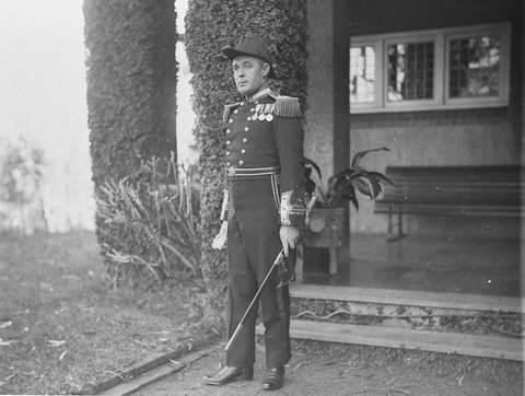 Lieutenant commander wearing cocked hat sword and epaulettes, 1930s