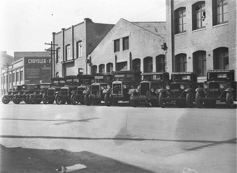 Lineup of H D McRaes trucks carriers, 1930s