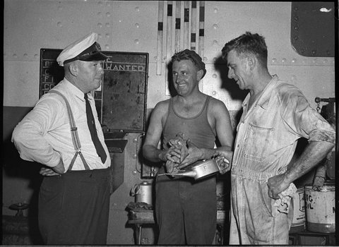 Main Roads Dept workmen repair damage caused when the vehicular ferry Lurgurena hit the landing ramp on the Stockton side, 1957