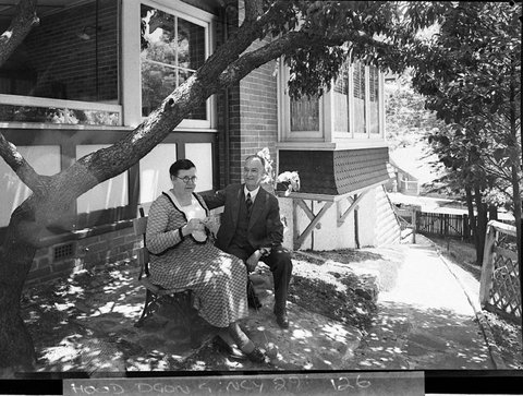 Mr and Mrs Corbett in the garden of their home at Old South Head Road Bondi, 1937