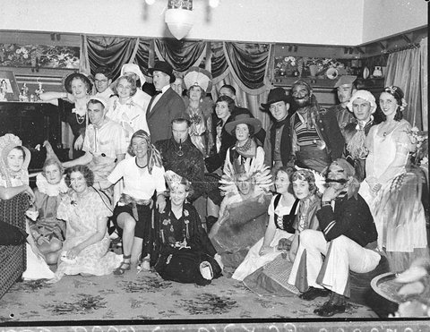 Mrs Tomalins farewell party costumed group, 1937