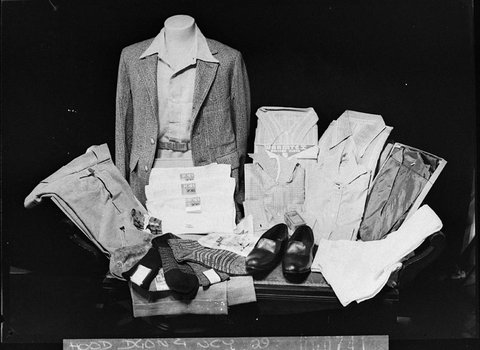 Mutual Group System copy for Mr Lamb A layout of mens clothing showing pants jacket underclothes shoes socks belt and ties, 1938