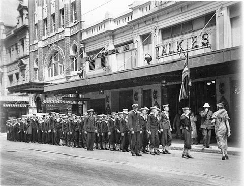 Navy League cadets marching into the Mayfair Theatre, c. 1935