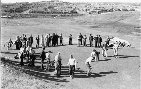 Players putting at the eighteenth, 1930s