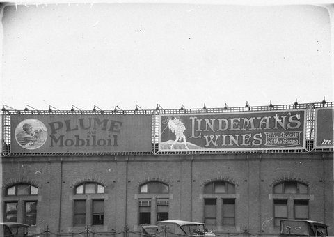 Plume Mobiloil Lindemans Wines billboards Central Railway Station, 1920s