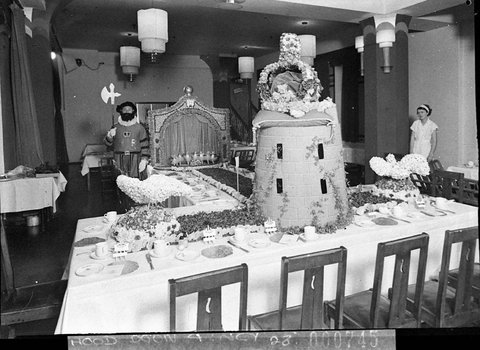 Regent Theatre table unidentified theatrical ball with beefeater attendant and a model stage setting and tower with crown, 1937