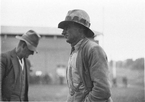 Relief workers listening to officials, 1934