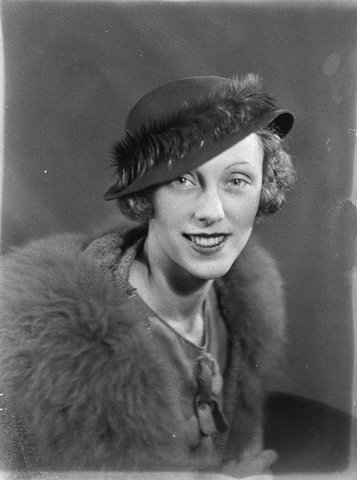 Retouched portrait of unidentified woman with hat probably a radio actress, 1930s