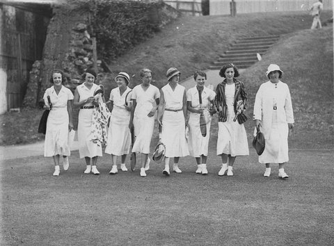 Seven unidentified players and an official, c. 1926