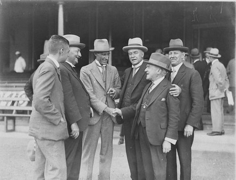 Six unidentified men greet each other They are probably cricket officials Ted Hood 2041988, 1940