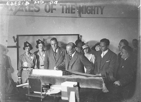 Some VIPs sign the visitors book before going up to the lookout Two pylon hostesses in picture, 1930s