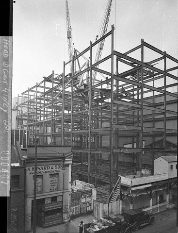 Steelwork girders being erected for new building, 1938