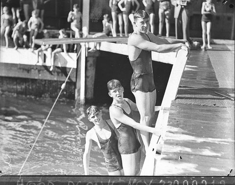 Three young men swimmers, 1935