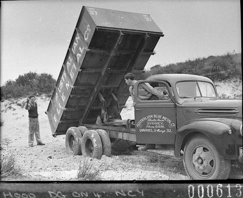 Truck tipping its load Australian Blue Metal Co trucks for Mr Freeman Ford News, 1944