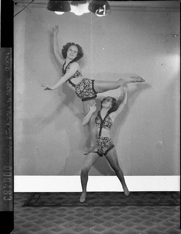 Turner twins dancers demonstrate Mignon hosiery, 1937