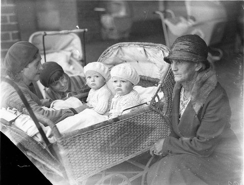 Twins in pram, 1930s