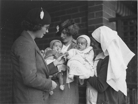 Two mothers with their baby entrants, 1930s