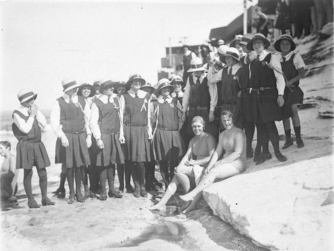 Two teachers in swimming costumes with Bethlehem College Ashfield schoolgirls in uniform, 1930s