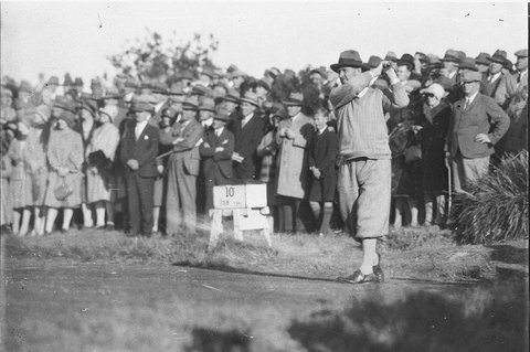 Unidentified golfer driving off from 10th tee, 1930s