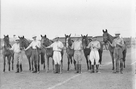 Unidentified polo team with their ponies, 1930s