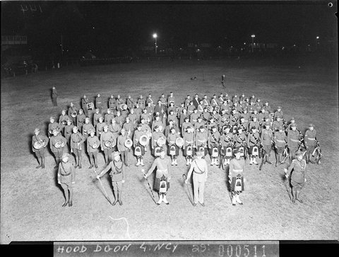 Victoria Barracks magnesium flashlight photograph of a combined Army and Scottish Highland mass pipe and brass band rehearse for the Sesquicentenary celebrations, 1938