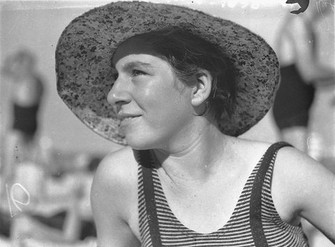 Woman in beach hat, c. 1932