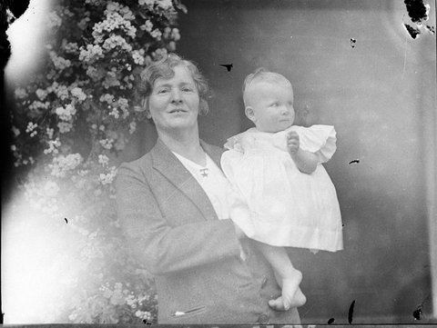 Woman with a baby, c. 1934