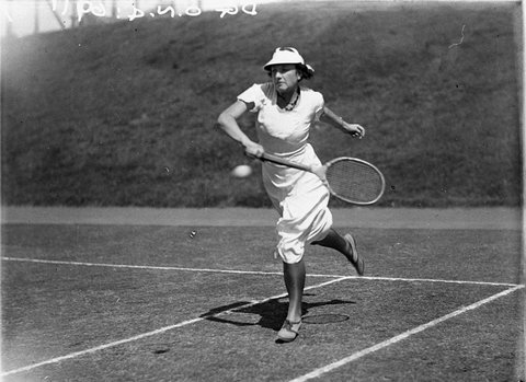 Womens tennis player in action, c. 1930
