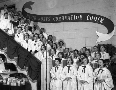 David Jones' Coronation Choir singing in the Elizabeth Street store, Sydney, June 1953 ? - photographer Australian Photographic Agency