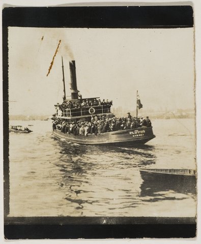 Steam tug Pluvius taking passengers who usually travelled by ferry - ferry strike, 1910 on Sydney Harbour from Royal Australian Historical Society - Sydney photographs, ca. 1879-1956