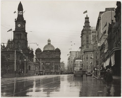 Town Hall and Queen Victoria Markets `Kings Jubilee Day' , Sydney, ca. 6 May 1935, by Harold Cazneaux, 1933