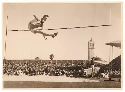 High jumper Metcalfe, Empire Games in Sydney for Sesquicentenary, 1938, by Sam Hood