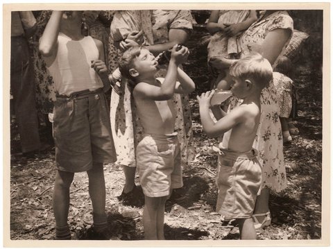 Children drink soft drinks at a picnic, 1940's-1953, by Sam Hood, 1935