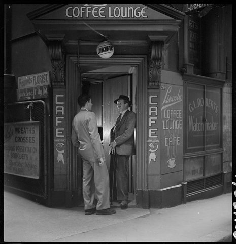 Dick Gooding (on right of door) from Lincoln Coffee Lounge and Cafe, Rowe Street, Sydney - photographed by Brian Bird c. 1948-1951, 1948–51