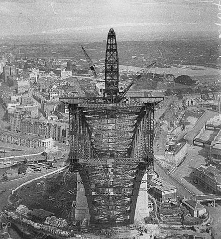 View from pulley-wheels of north side creeper-crane (jibbed right out) looking into box section of south side arch, Sydney Harbour Bridge, May 1930 - Ted Hood (hanging upside down 130 metres - 420