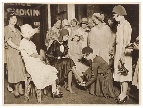 Trying on shoes, ca. 1930 - by Sam Hood, c. 1930