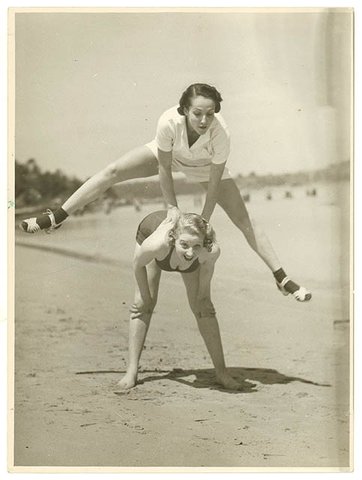 Valerie Hays from the cast of "Over she goes" being leapfrogged, 1937 - by Sam Hood
