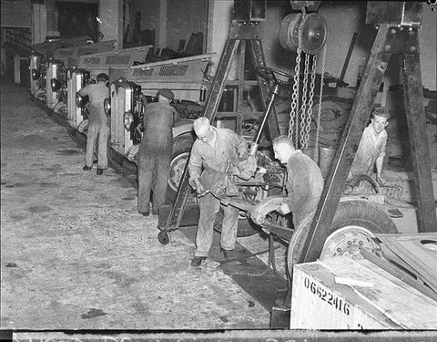 Assembling the bodies on AEC bus chassis, Nov. 1937