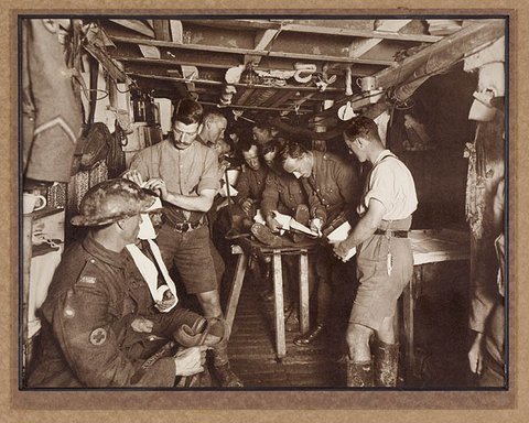 Attending to wounded in the advanced dressing station on Hill 60, 1917–18