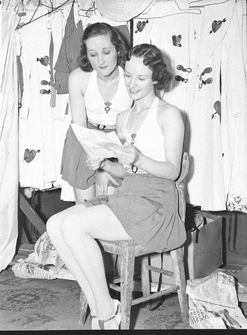 Backstage- girls receiving letters (taken for J.C. Williamson), Theatre Royal. Sydney, ca. 1937 - photographer Sam Hood, c. 1937
